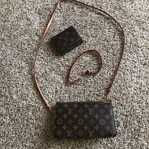 Louis Vuitton cross over/wristlet with wallet